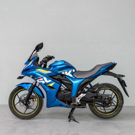 Used Suzuki Gixxer SF in blue color with sporty decals, displayed in Gurgaon showroom for sale under Motorcycles & Scooters category.