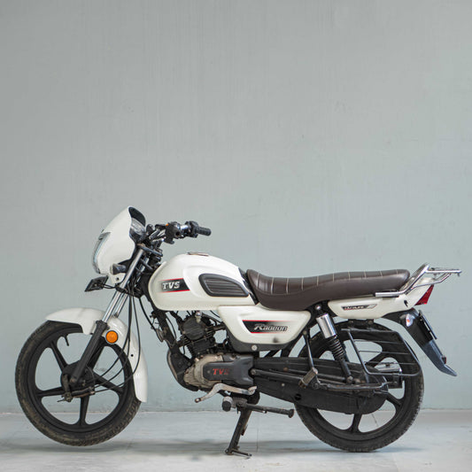 TVS Radeon left side view used bike in Gurgaon white color commuter motorcycle high mileage